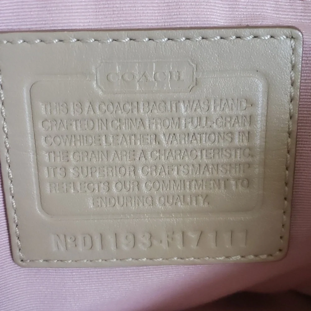 Coach Soho tan stitched satchel with buckle front accent